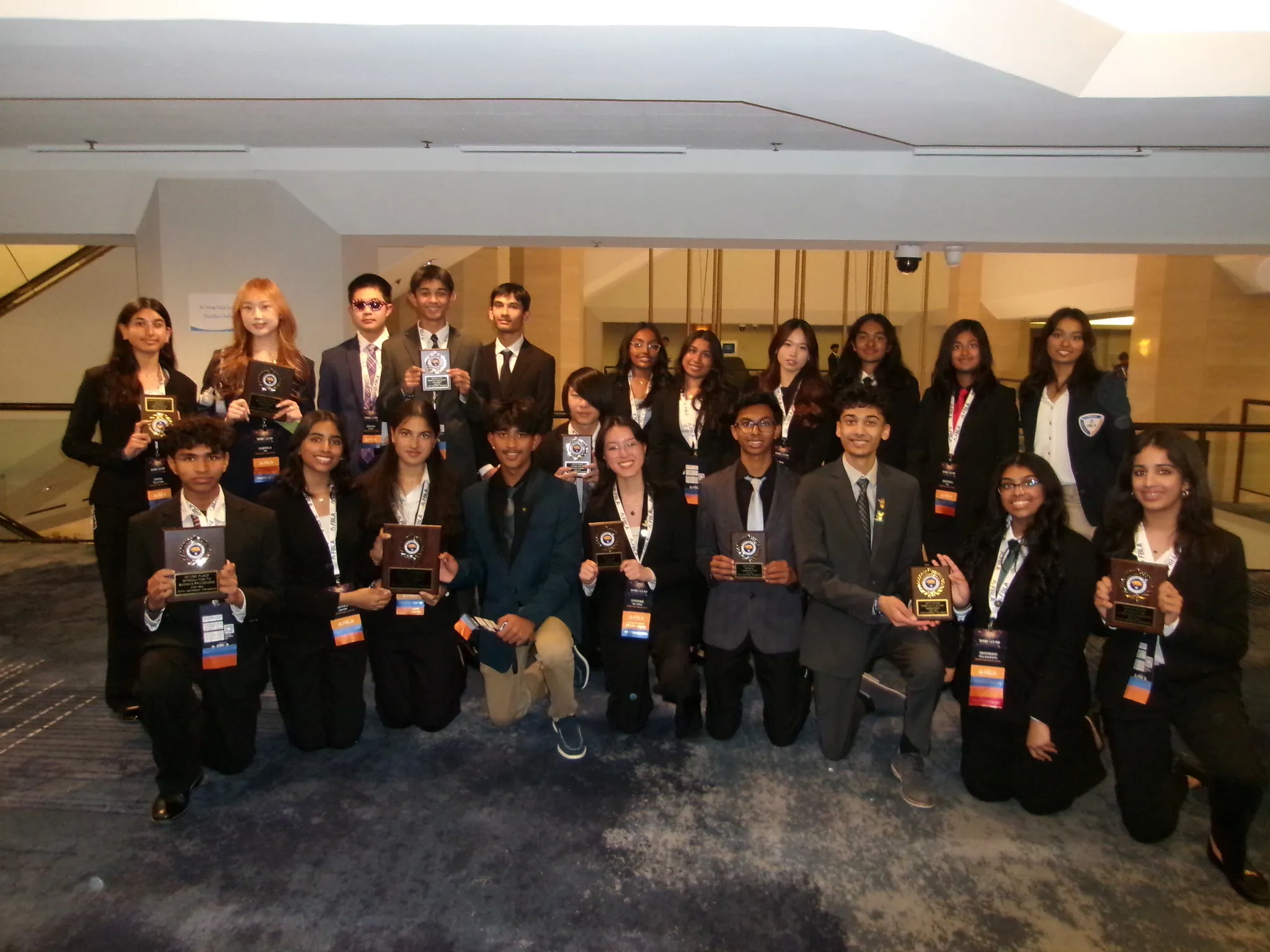 Irvington FBLA members holding their awards at the 2025 State Leadership Conference
